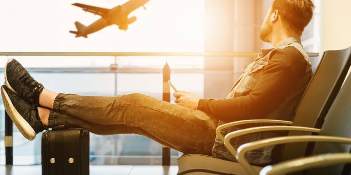 man waiting at airport